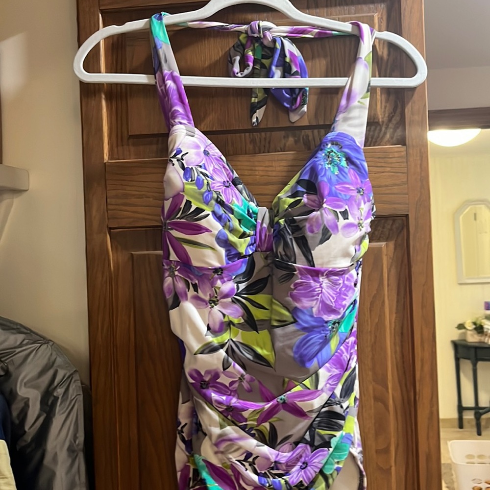 Multicolored one piece bathing suit. Excellent condition, no pulls.